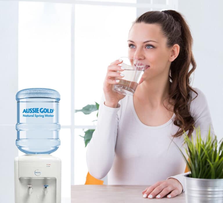 Young Woman Drinking A Glass Of Water