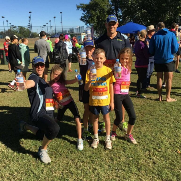 Children Holding Water Bottles