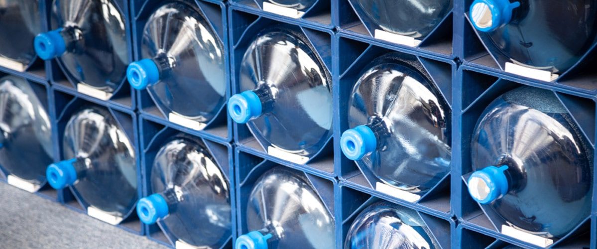 Gallons of Water Stacked at the Warehouse — Spring Water Online in Isaac, QLD