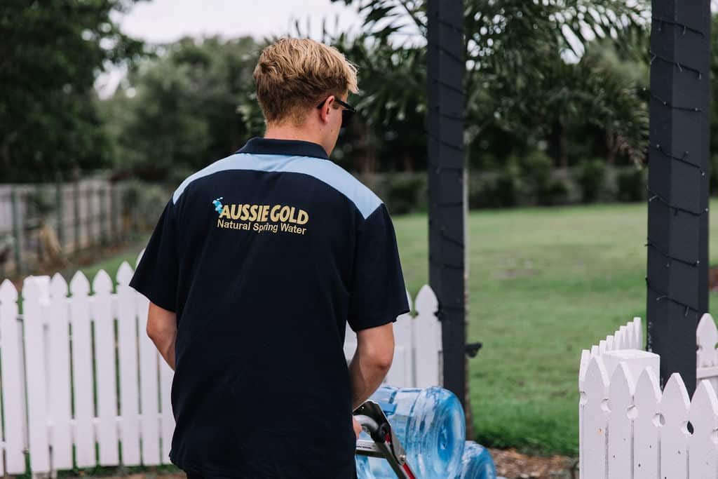 Men Delivering Water — Spring Water Online in Emerald, QLD