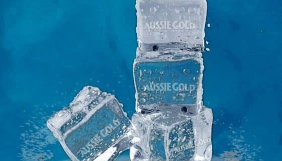 Ice Cubes Stacked On A Blue Background — Spring Water Online in Tieri, QLD