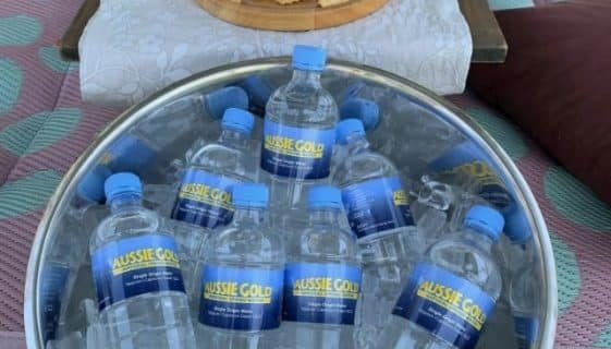 Bottle Of Spring Waters Offered In A Picnic — Spring Water Online in Middlemount, QLD