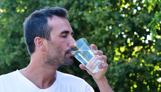 Man Drinking Fresh Water — Spring Water Online in Mackay, QLD