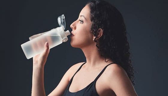 A Woman Drinking Water
