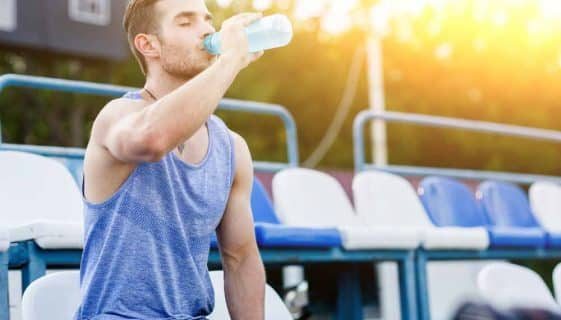 Man Drinking Water After An Exercise — Spring Water Online in Clermont, QLD